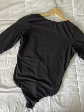 SKIMS Long-Sleeve Scoop-Back Bodysuit in Black